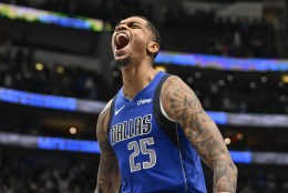 Dallas Mavericks forward P.J. Washington (25) celebrates during the second half against the Portland Trail Blazers at the American Airlines Center.