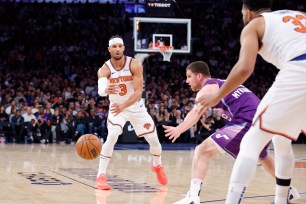 Josh Hart #3 of the New York Knicks bounce passes the ball to Karl-Anthony Towns #32 of the New York Knicks in the first half at the Madison Square Garden in New York, USA, Wednesday, November 01, 2025.