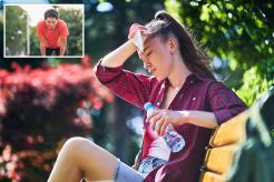 Erick Thohir sitting on a bench with a bottle of water and a tissue