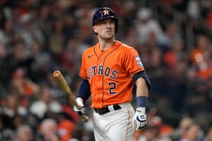 Houston Astros' Alex Bregman reacts after strking out during the third inning of Game 6 of the baseball AL Championship Series against the Texas Rangers Sunday, Oct. 22, 2023, in Houston.