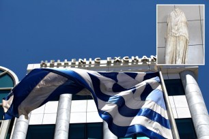 A flag and a statue of a man