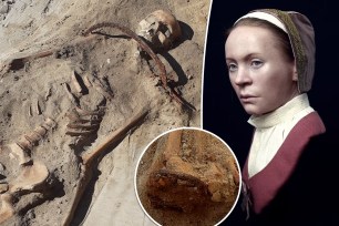 Remains of a female 'vampire' with a sickle across her throat are seen after they were unearthed at an archaeological site in a 17th-century cemetery in Bydgoszcz, Poland in August 2022.